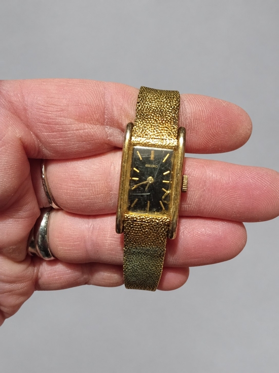 Seiko Accessories - Seiko Gold-Tone Rectangular Watch with Black Dial